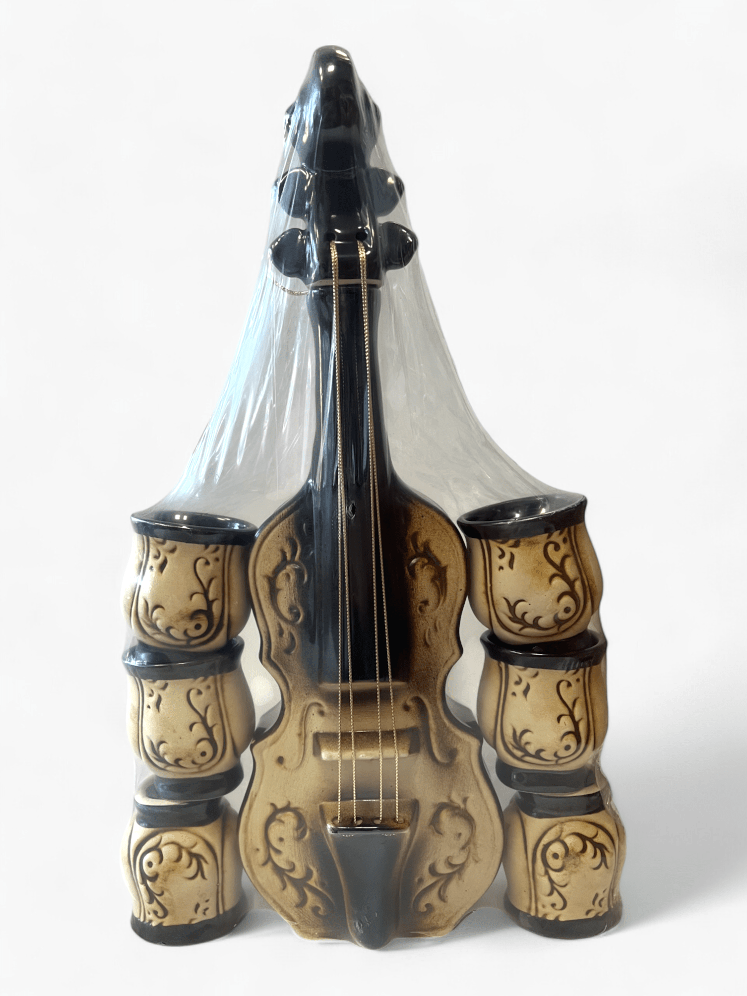 Picture of 7-piece set, violin-shaped bottle and 6 curved glasses for alcoholic beverages