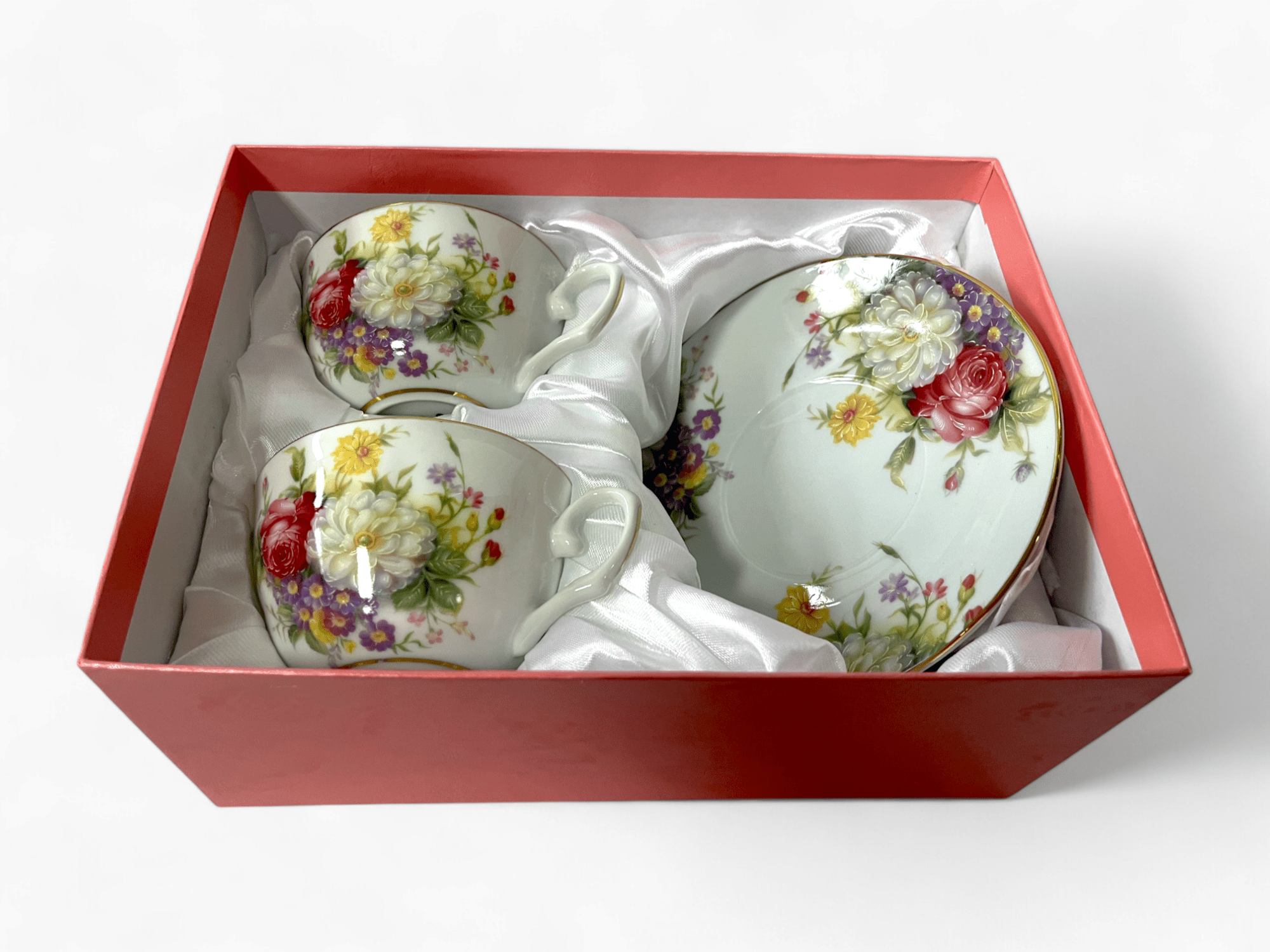Picture of Set of 2 cups and 2 saucers in fine eggshell porcelain with royal design in warm tones